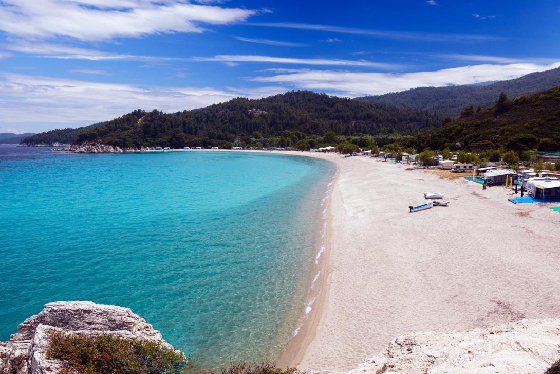 crystal-blue-waters-and-sandy-beach-in-halkidiki.jpg