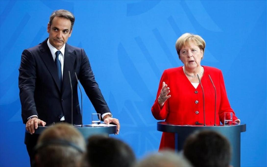 Μητσοτάκης - Μέρκελ (REUTERS/AXEL SCHMIDT)