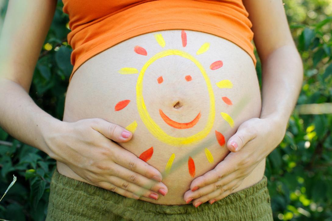summer-sun-pregnant-belly.jpg